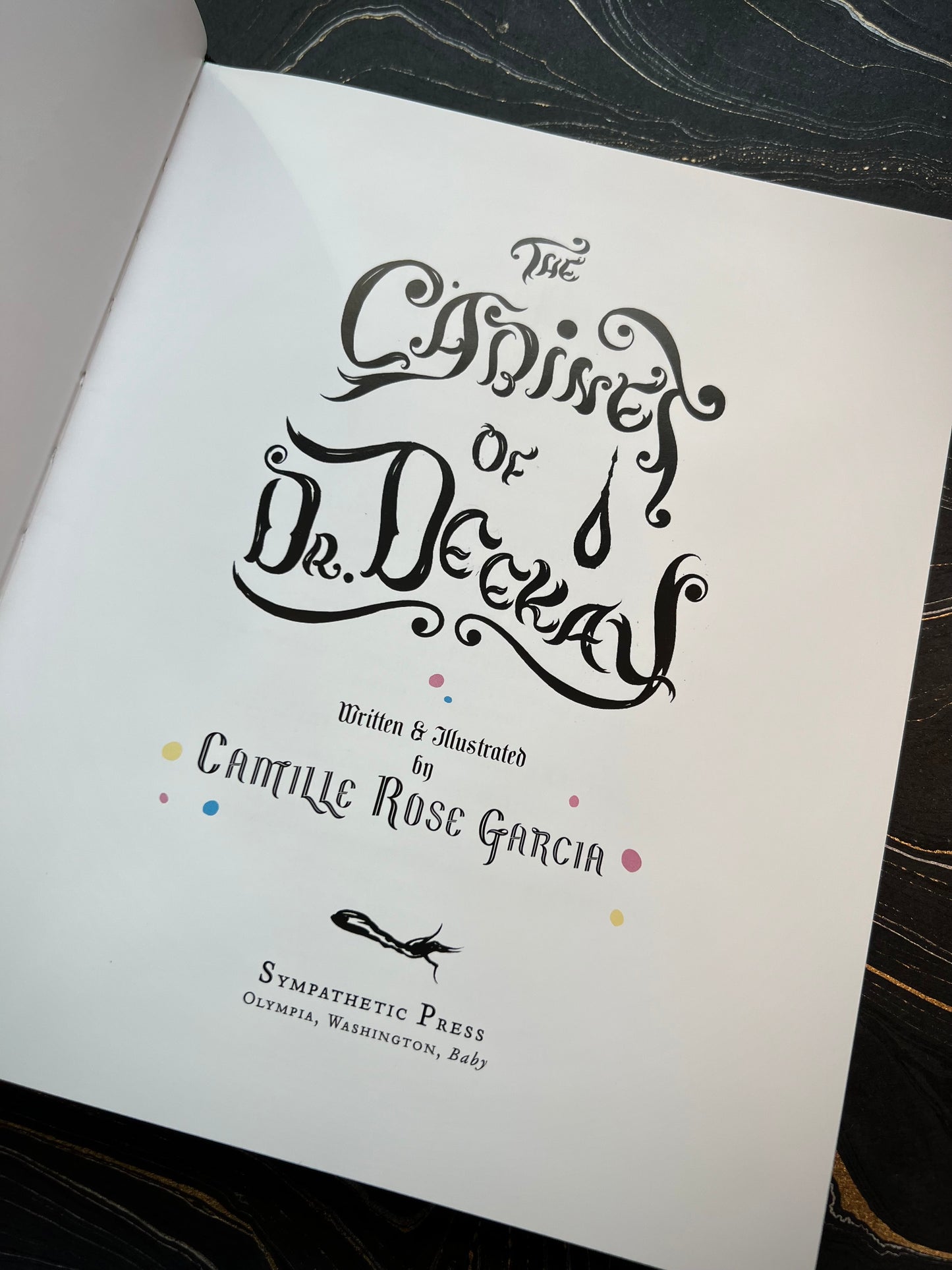 “The Cabinet of Dr. Deekay” Hardcover Book